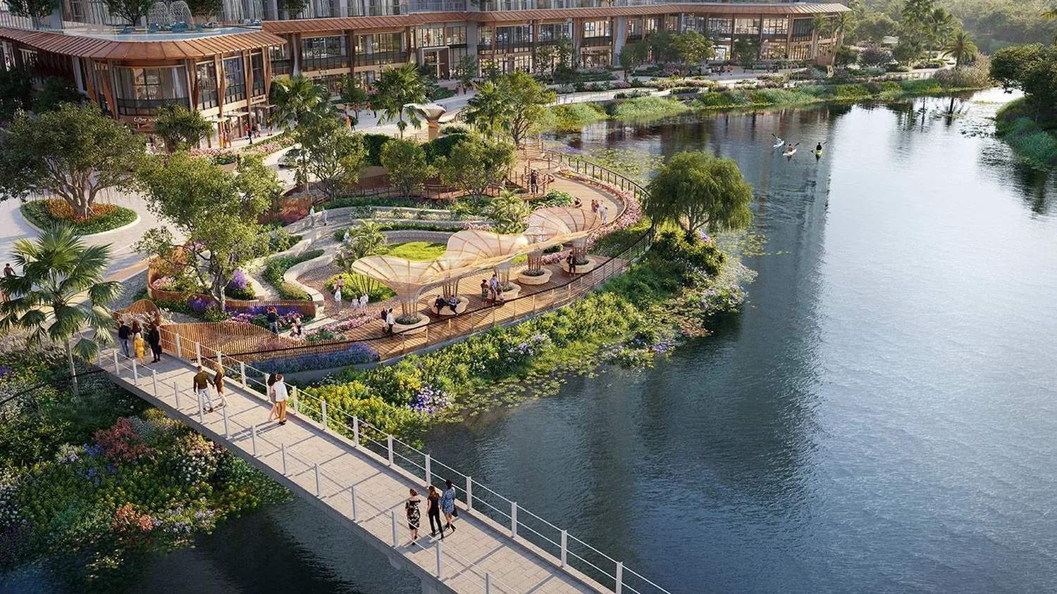 Đảo vườn Eaton Park: cù lao cây xanh nối bằng cầu bộ hành tại khúc quanh dòng nước.